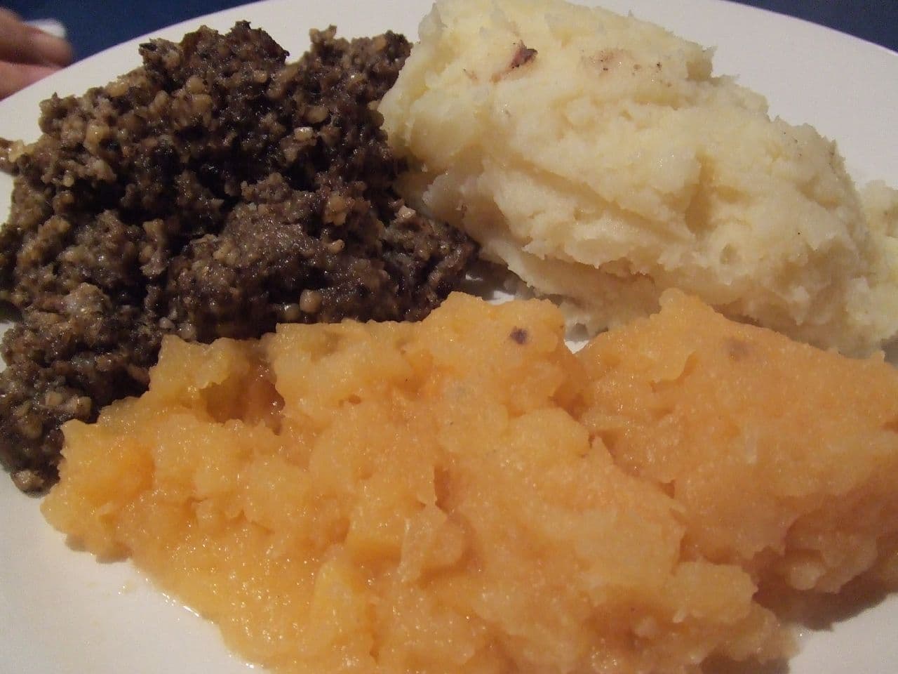 Haggis with neeps and tatties — Sandy Lyle's Scottish menu
